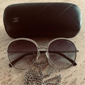 Timeless CHANEL sunglasses with chain,authentic. Sold out out everywhere.